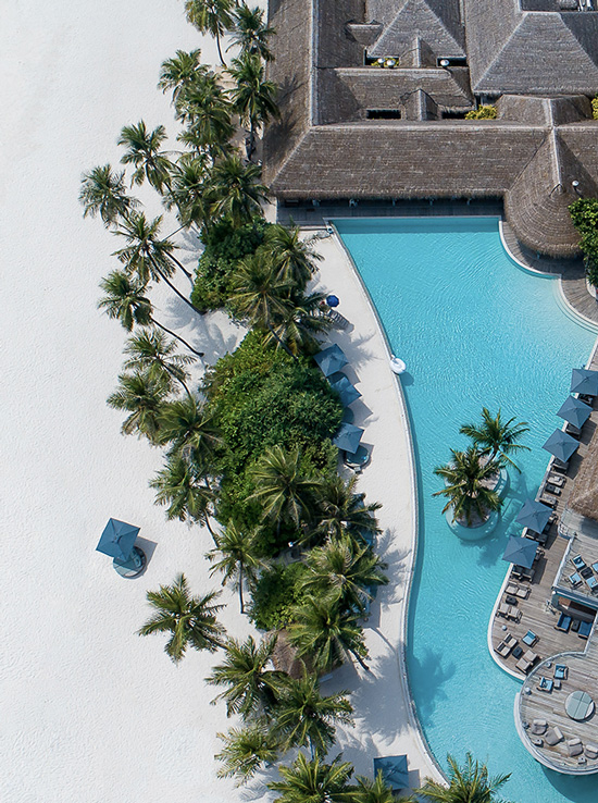 Overview of Oceanfront Resort with Turquoise Pool